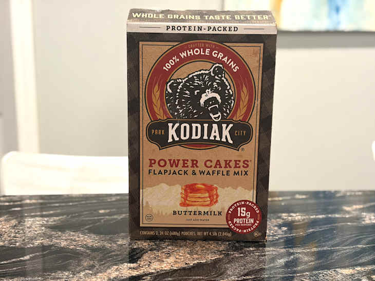 Kodiak Power Cakes mix on countertop.