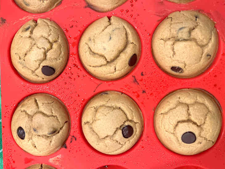 Chocolate chip cookies in baking mold.