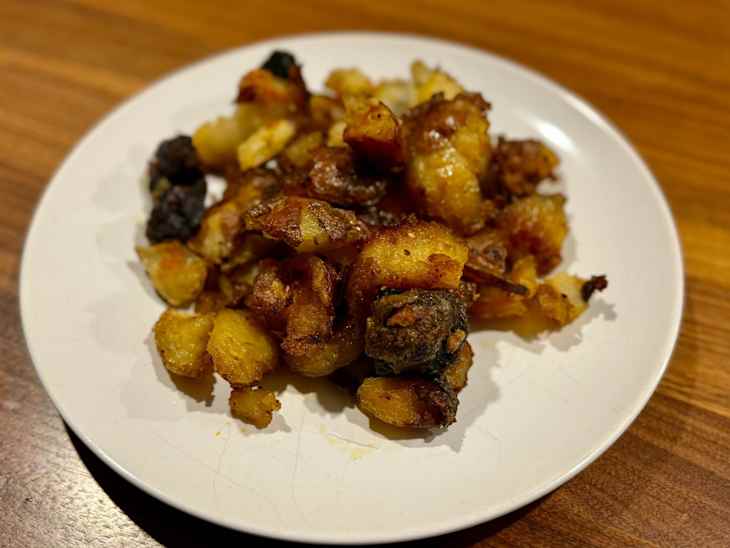 Roasted potatoes dusted with amchur powder.