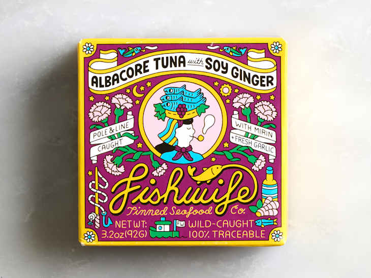 Colorful packaging for Fishwife Albacore Tuna with Soy Ginger, featuring illustrations of fish, flowers, and text details.