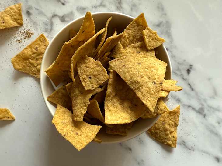 Tortilla chips in bowl.