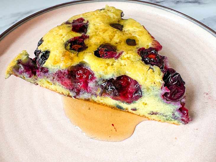 Slice of blueberry skillet pancake.
