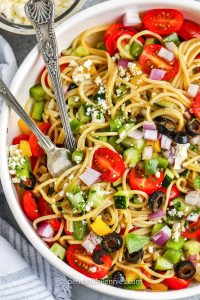Invigorating Summer Salad with Crunchy Vegetables, Tangy Dressing, and Tender Pasta