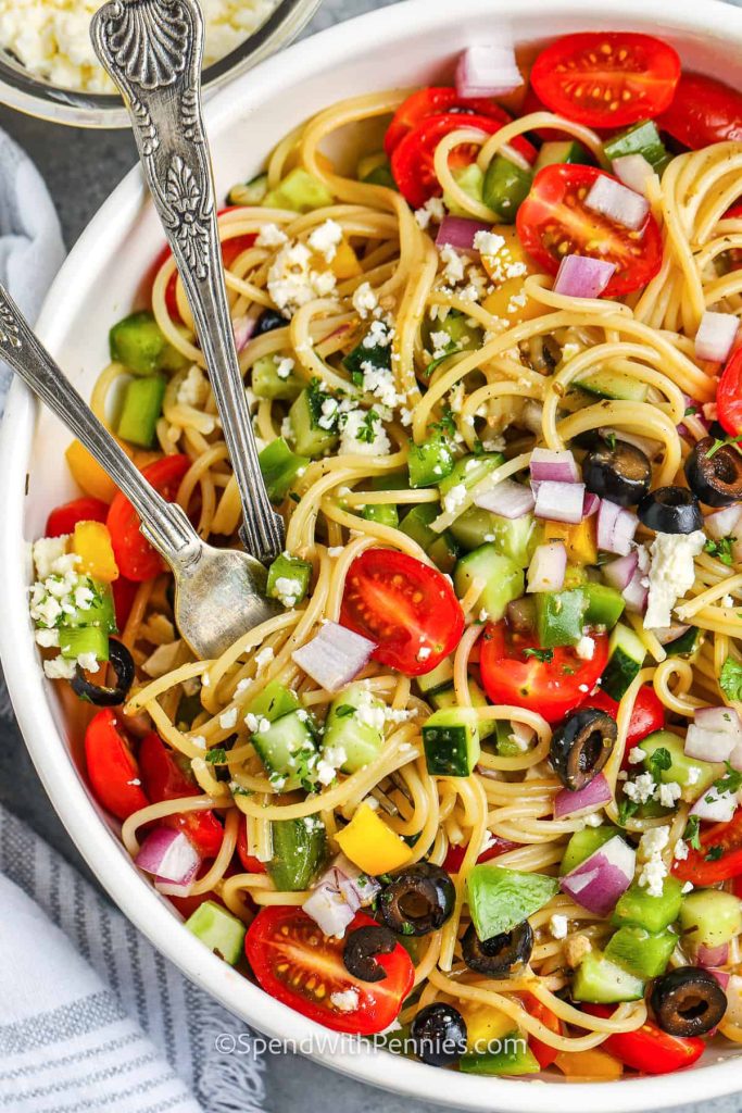 Invigorating Summer Salad with Crunchy Vegetables, Tangy Dressing, and Tender Pasta