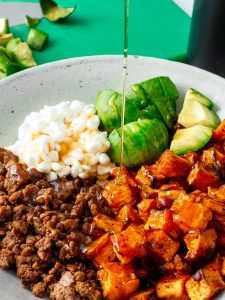 Ground Beef and Sweet Potato Dish Finished with Spicy Honey and Cottage Cheese