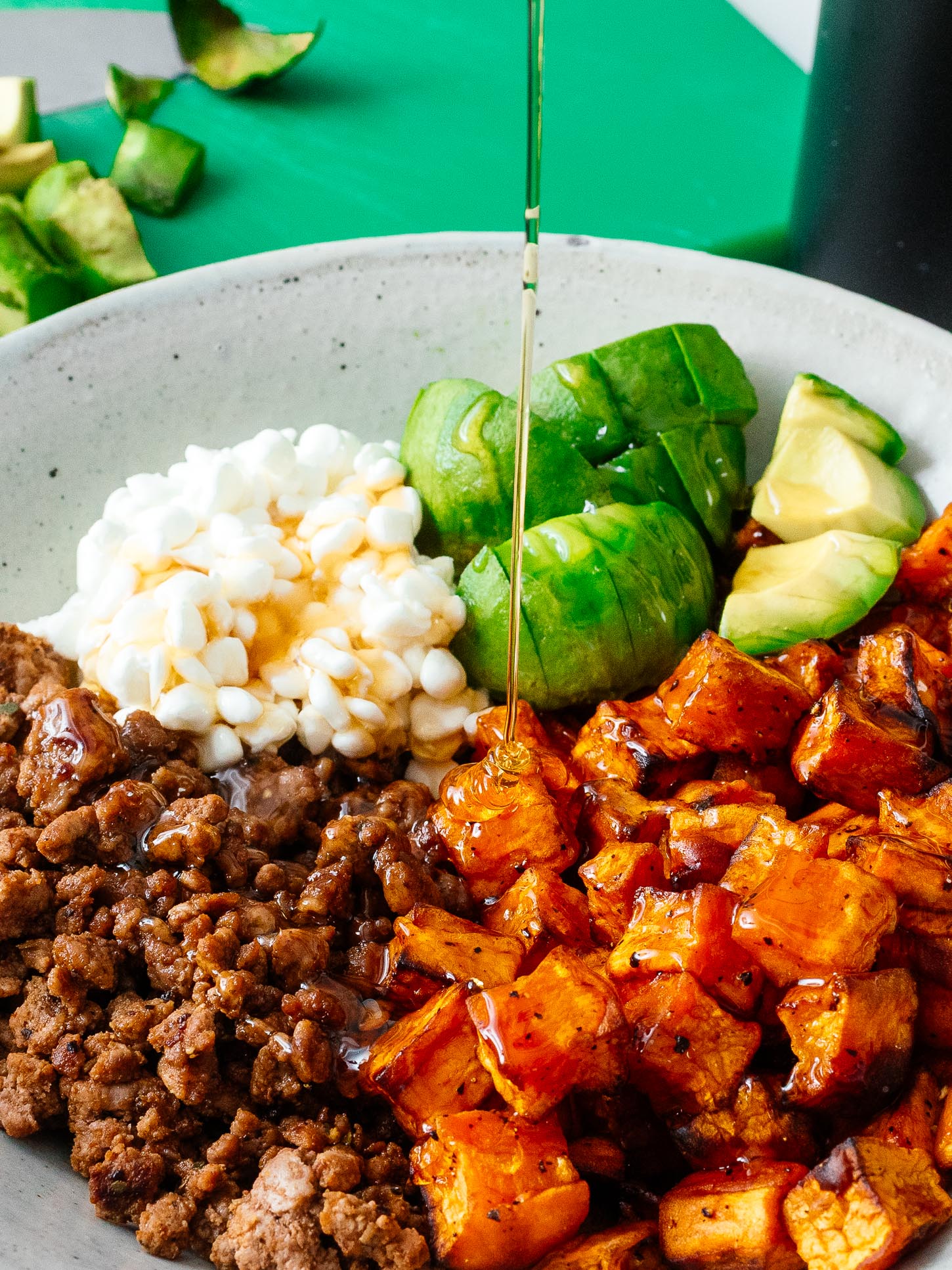 Ground Beef and Sweet Potato Dish Finished with Spicy Honey and Cottage Cheese